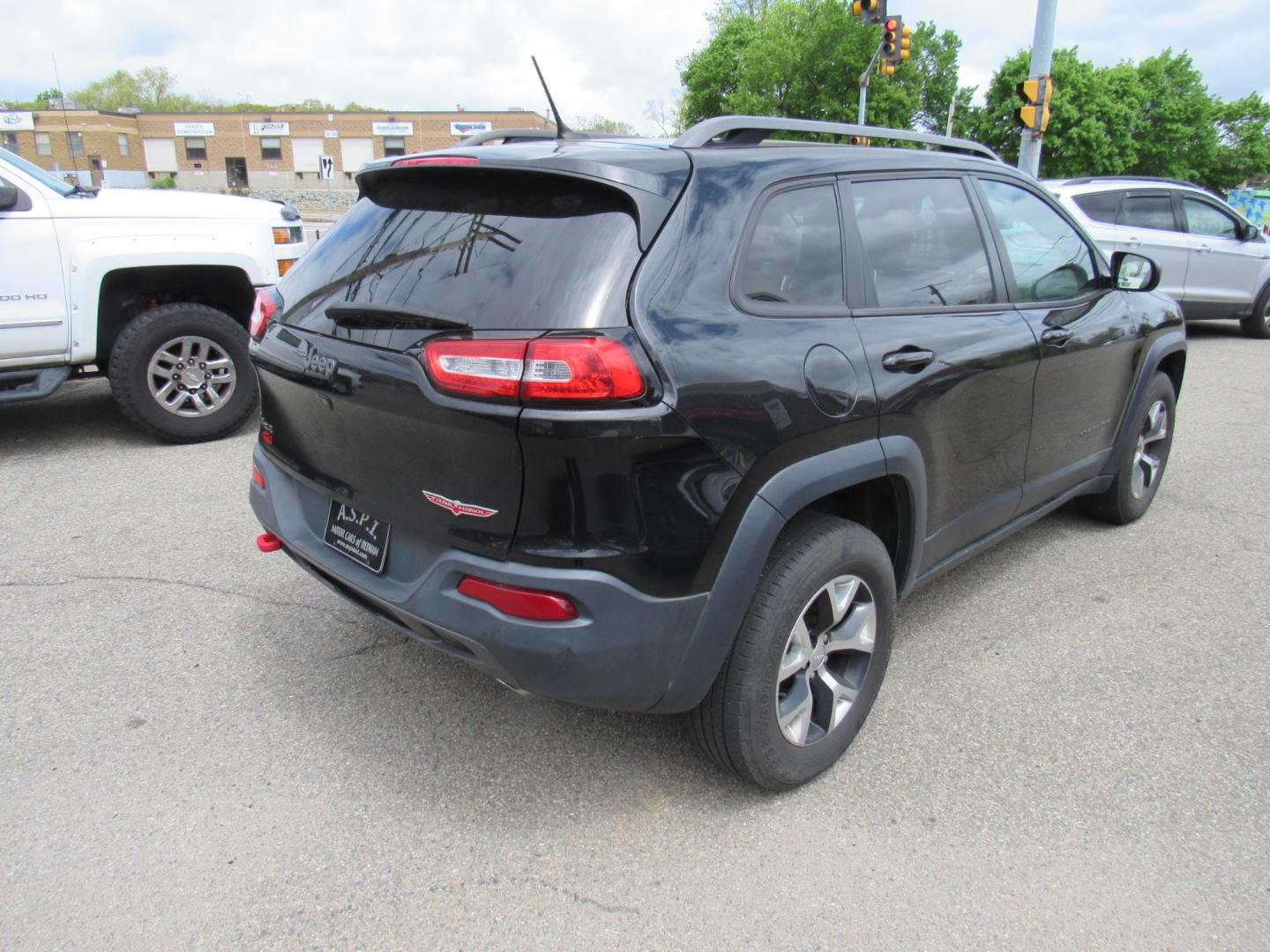 2014 BLACK /Black Jeep Cherokee Trail Hawk (1C4PJMBS0EW) , Automatic transmission, located at 215 Milton St, Dedham, MA, 02026, (781) 329-5144, 42.241905, -71.157295 - This nice compact SUV is in excellent condition.Runs like new. All ASPI Motor Cars vehicles are fully serviced before they are delivered to assure the highest quality used vehicles. Comes with a 3/3 warranty included in the price. Call for details. Prices on all vehicles do not include $299.95 - Photo#6